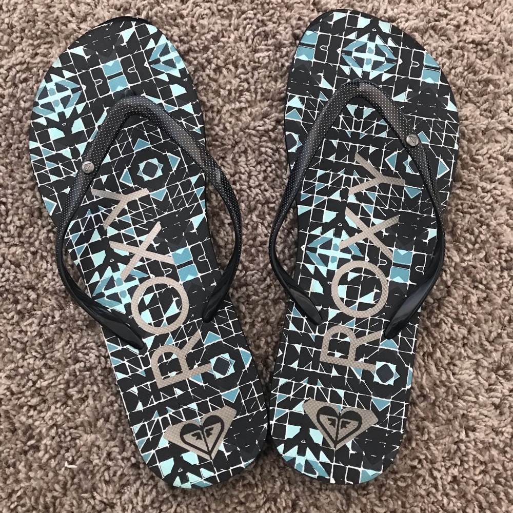 Blue and black flip-flops